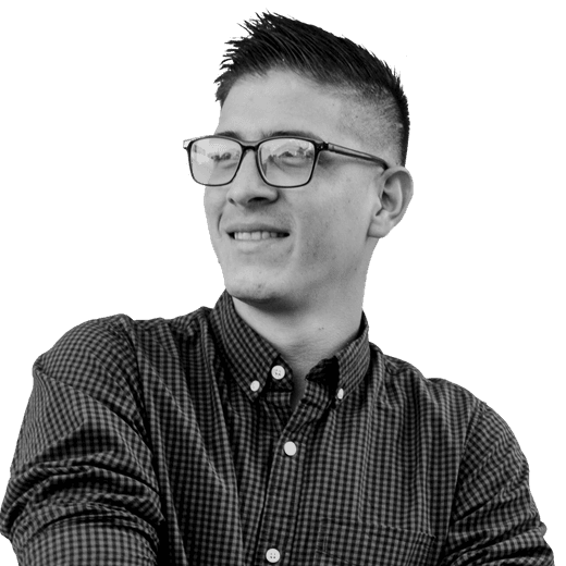 Yefri Gonzalez wearing glasses and a checked shirt