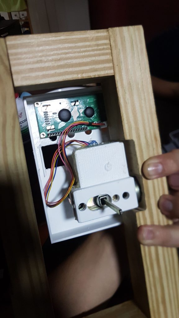 Door lock mechanism during final assembly, second view